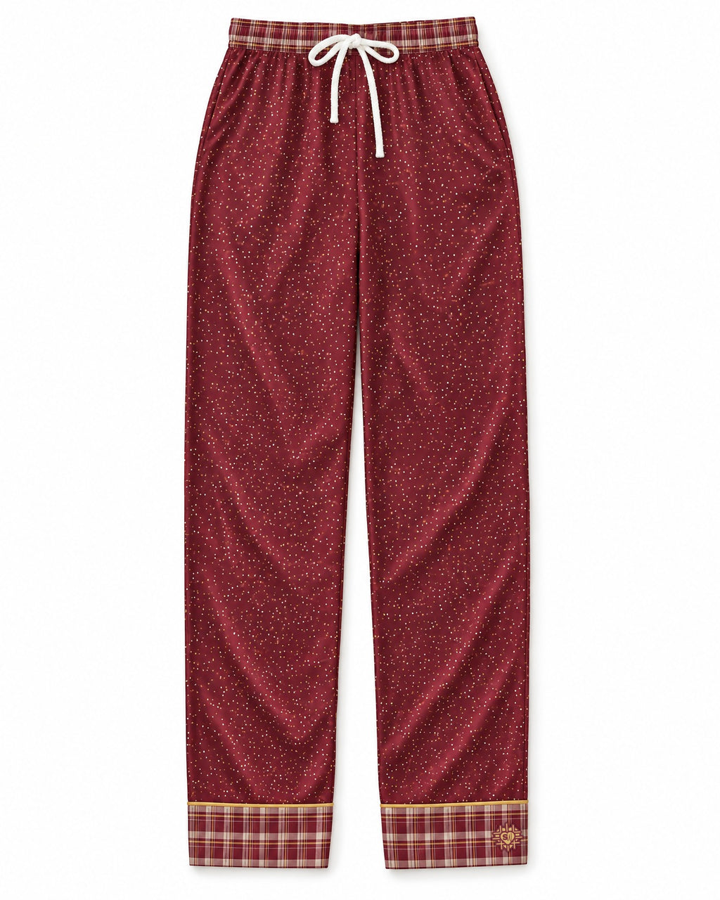 Garnet & Honey satin pajama pants laid flat on white: wine-dark garnet satin with honey-gold and cream dots, plaid waistband and cuffs, white drawstring bow