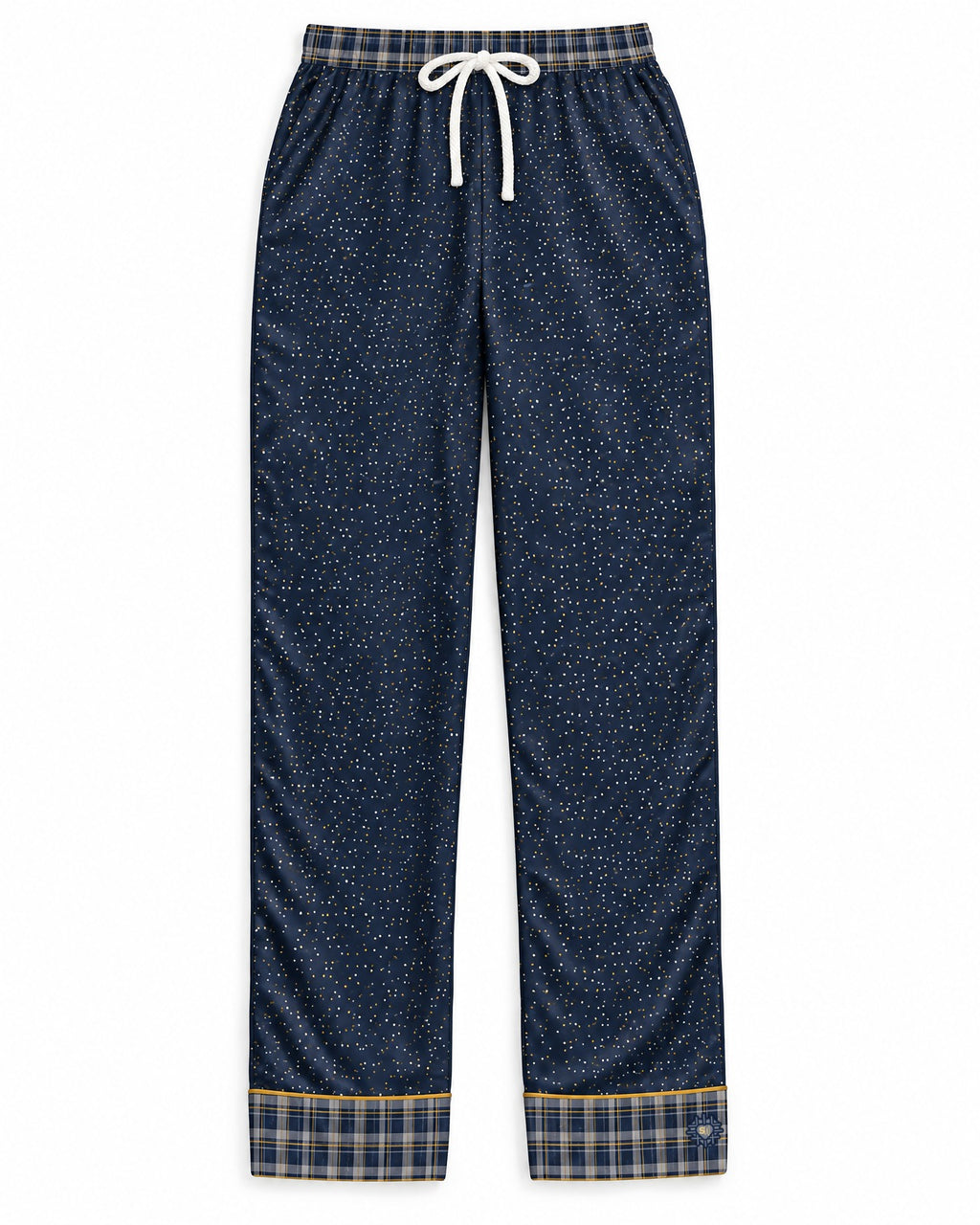 Navy & Brass satin pajama pants laid flat on white: navy satin with tiny brass-gold and cream dots, plaid waistband and cuffs, white drawstring bow