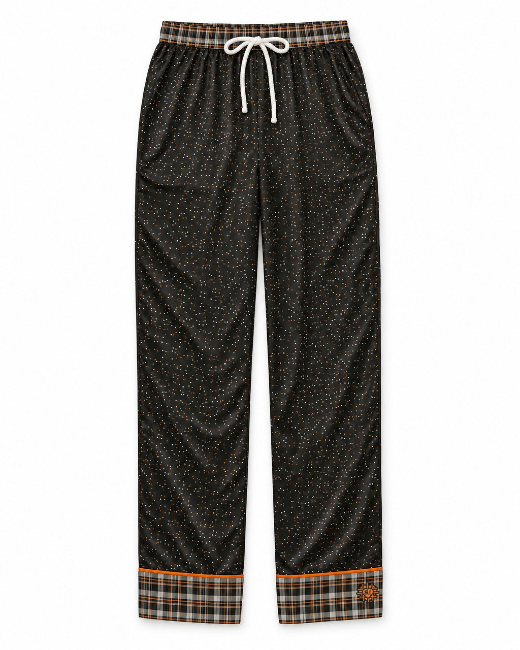 Orange & Licorice satin pajama pants laid flat on white: licorice-black satin with tiny orange and cream dots, plaid waistband and cuffs, white drawstring bow