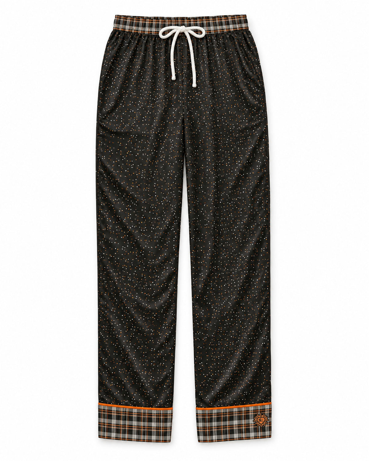 Orange & Licorice satin pajama pants laid flat on white: licorice-black satin with tiny orange and cream dots, plaid waistband and cuffs, white drawstring bow