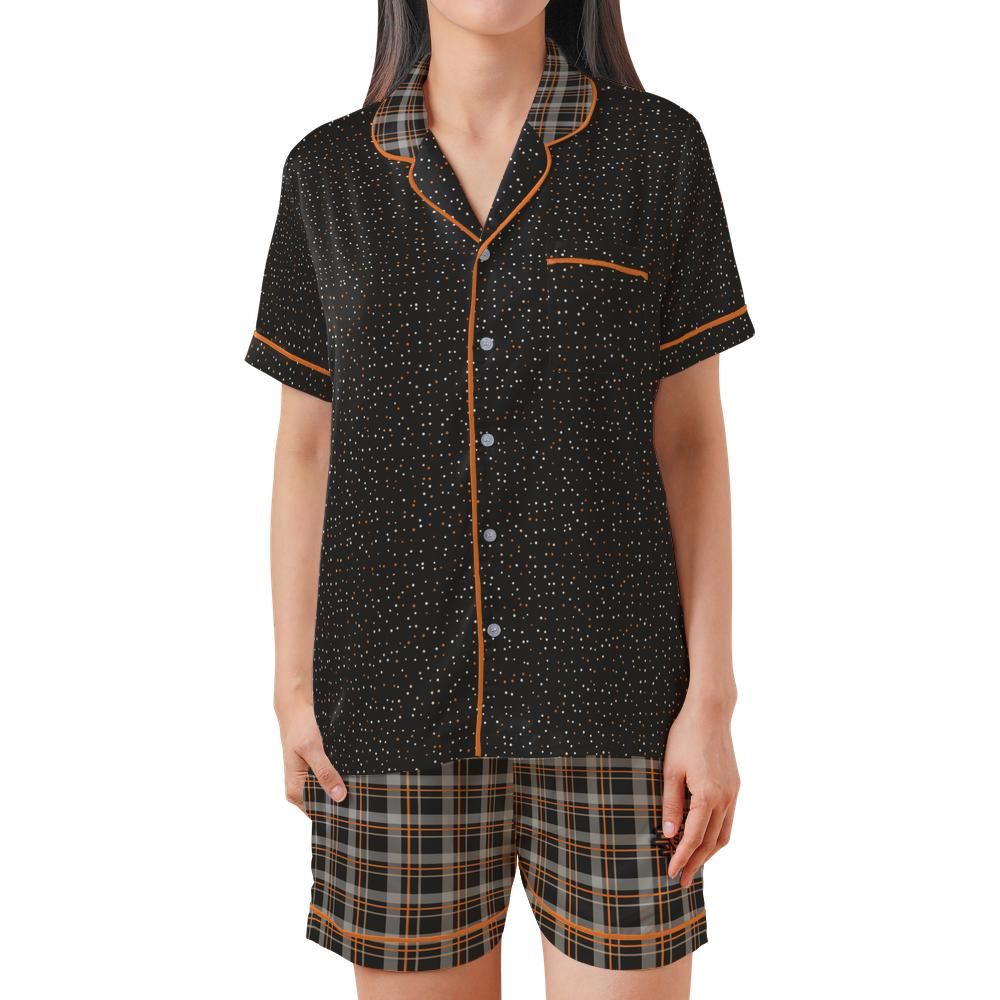 Front view of the Orange & Licorice satin pajama set on a model against a white background