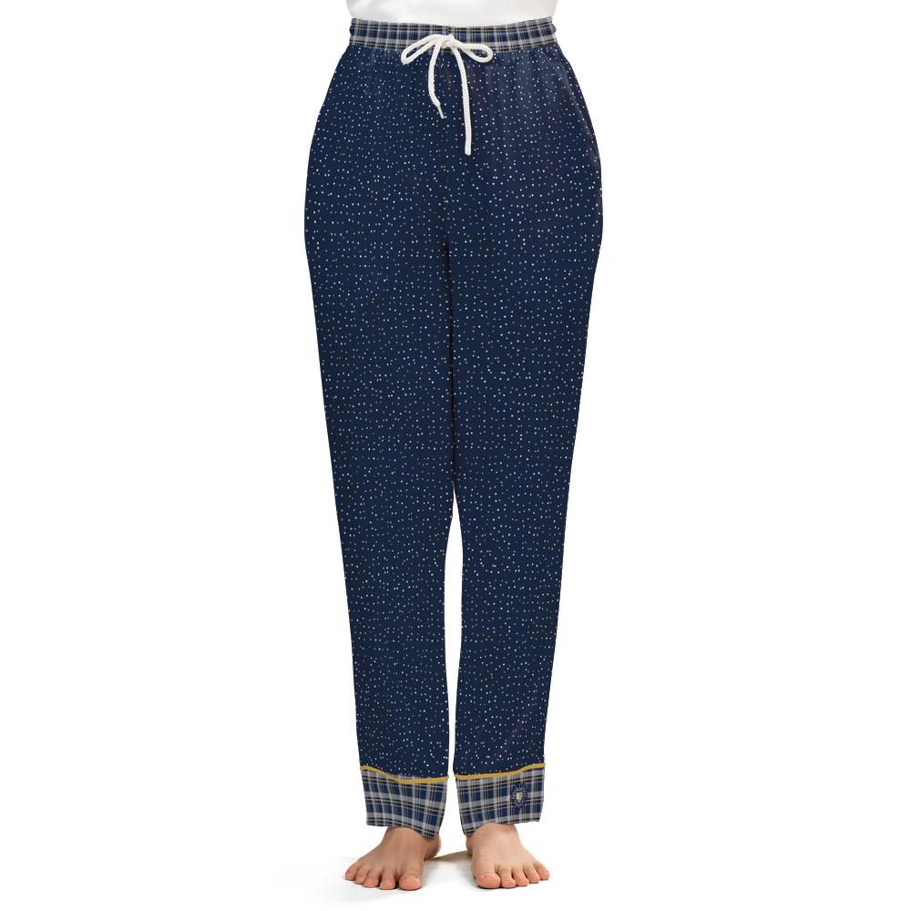 Front view of the Navy & Brass satin pajama pants on a model against a white background
