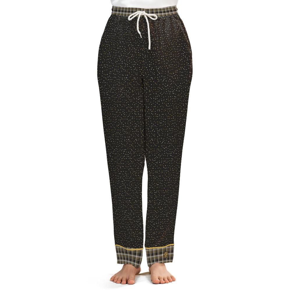Front view of the Black & Butterscotch satin pajama pants on a model against a white background
