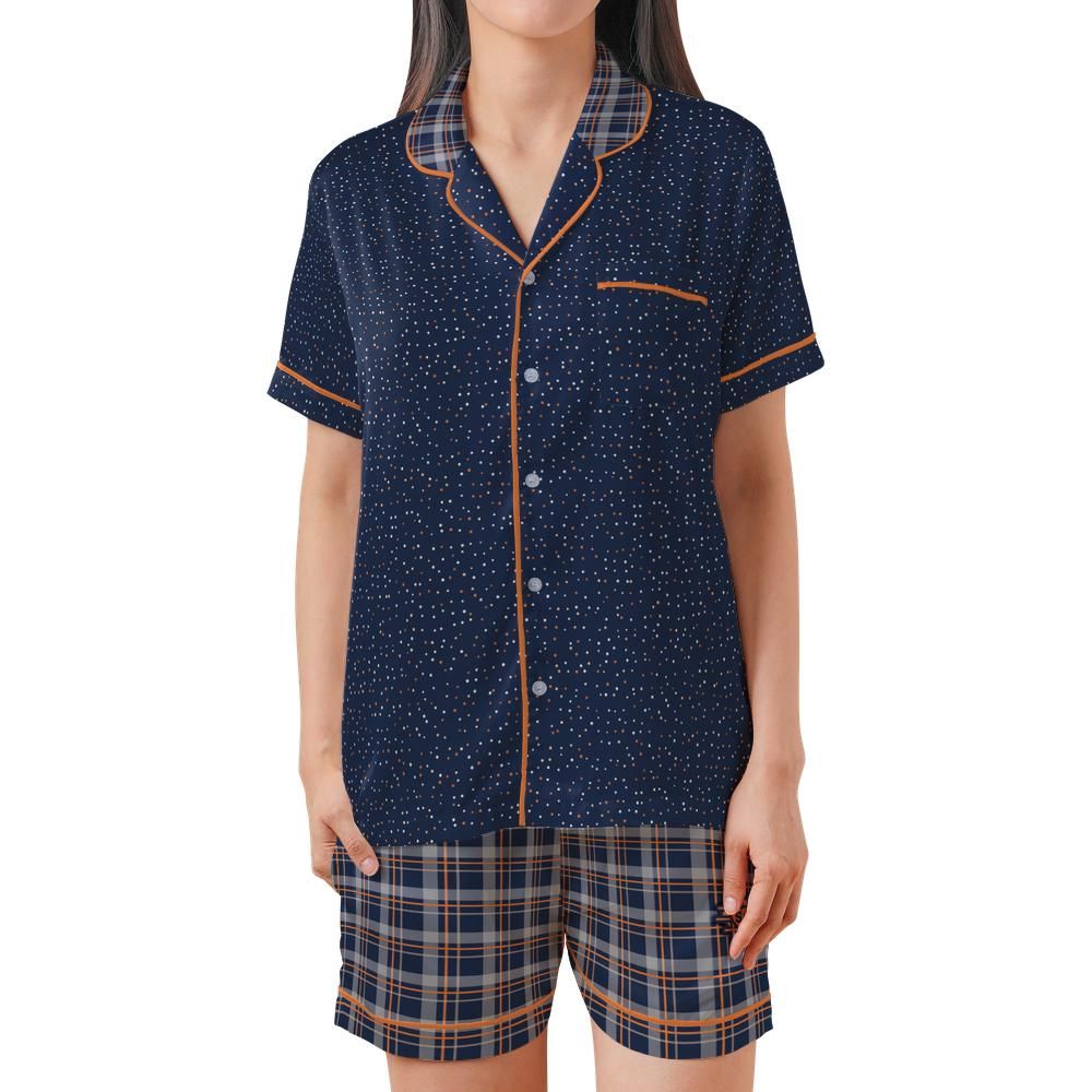 Front view of the Orange & Ink satin pajama set on a model against a white background